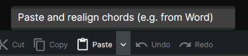 The Paste button in the editor toolbar with the menu open showing the “Paste and realign chords” option