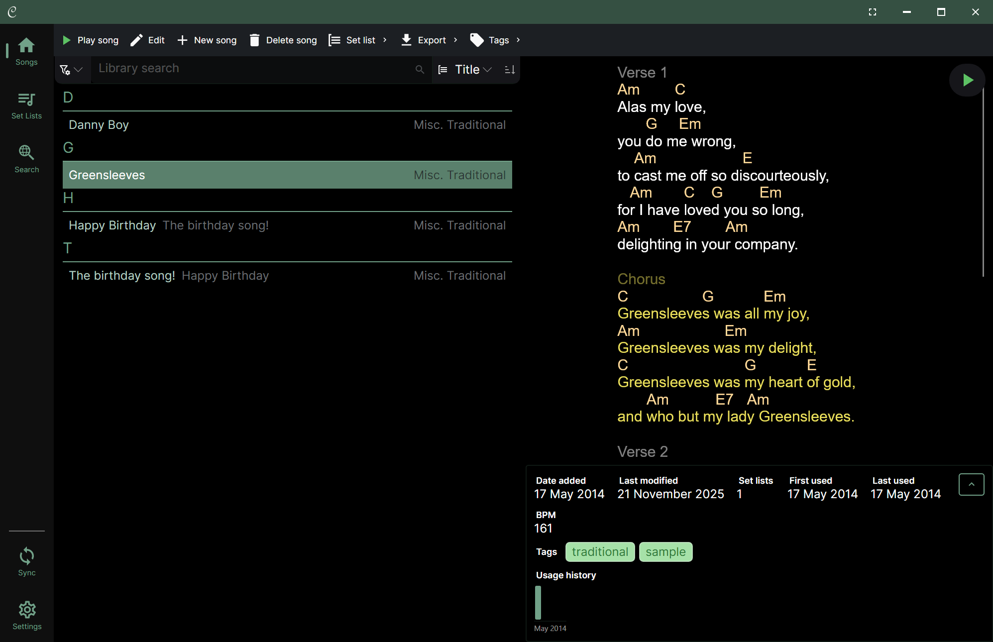 A screenshot of the Chordle interface featuring a dark theme. The UI is divided into a navigation sidebar on the left, a searchable song library list in the center, and a large preview pane on the right displaying chords and lyrics for the selected song, &ldquo;Greensleeves.&rdquo; A toolbar at the top contains buttons for song management and playback, while the bottom right shows song metadata like BPM and tags.